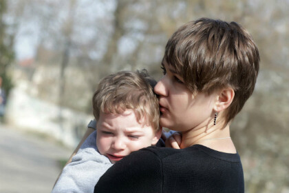 St. Louis mother holding son