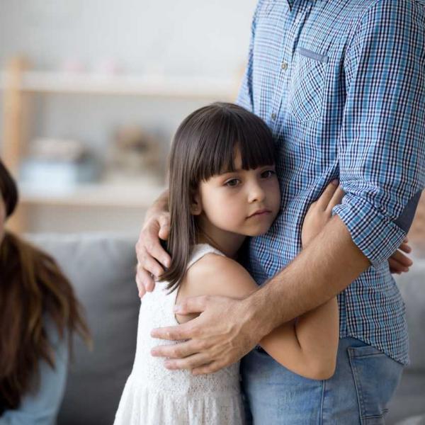 child hugging father